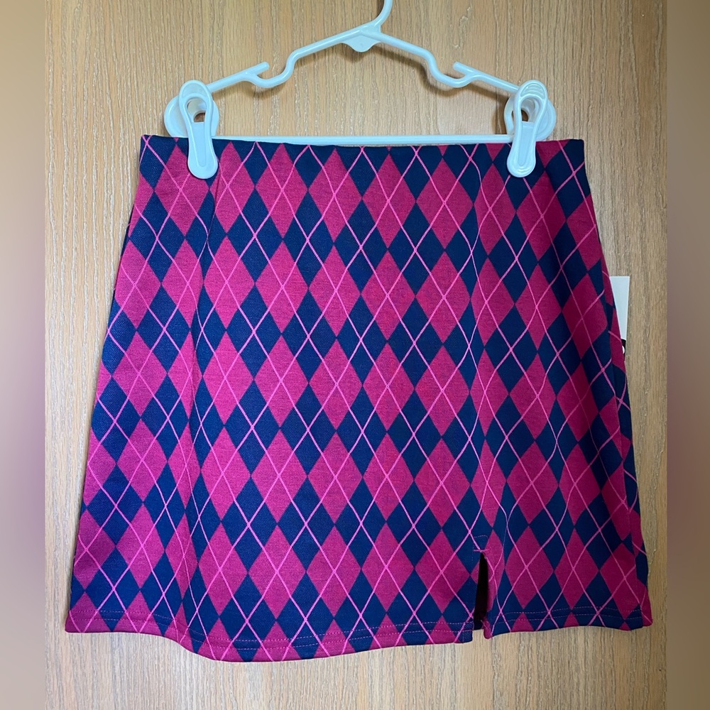 Plaid mini skirt. Never worn.